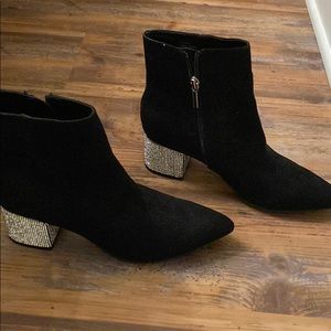 Black suede booties with rhinestone heels